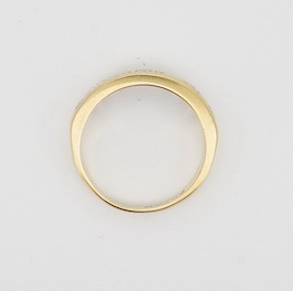 A modern 18ct gold and seven stone diamond set half hoop ring, size M, gross weight 4 grams.